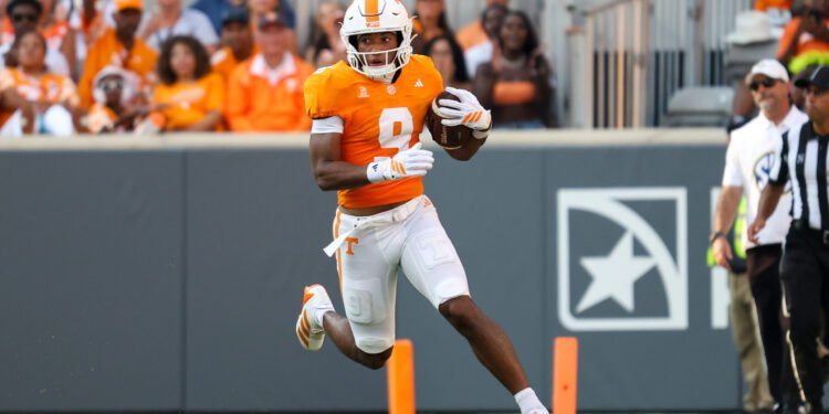 Sep 5, 2026; Knoxville, Tennessee, USA; Tennessee Volunteers wide receiver Joakim Dodson (9) runs the ball against the Furman Paladins during the second half at Neyland Stadium. Mandatory Credit: Randy Sartin-Imagn Images