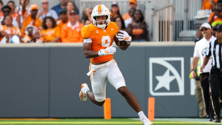 Sep 5, 2026; Knoxville, Tennessee, USA; Tennessee Volunteers wide receiver Joakim Dodson (9) runs the ball against the Furman Paladins during the second half at Neyland Stadium. Mandatory Credit: Randy Sartin-Imagn Images